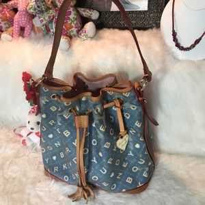 Authentic Dooney and Bourke draw string bucket bag
